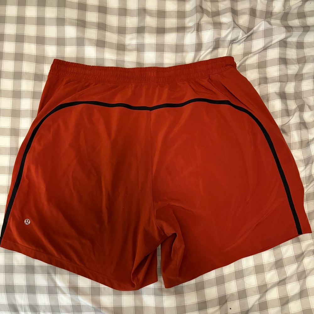 Orange LuLu lemon shorts.